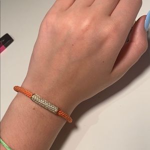 Orange Michael kors bracelet